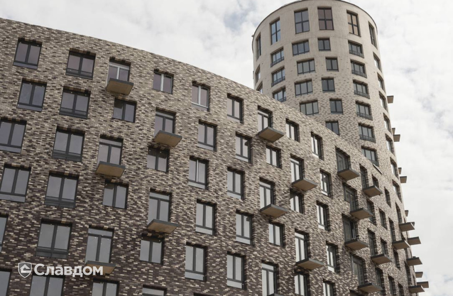 Жилой район с облицовкой кирпичом Roben Oslo perlweiss, Faro grau, Faro schwarz-nuanciert, Chelsea basalt-bunt, Manchester
