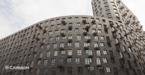 Жилой район с облицовкой кирпичом Roben Oslo perlweiss, Faro grau, Faro schwarz-nuanciert, Chelsea basalt-bunt, Manchester