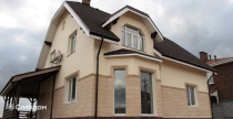 Загородный дом с облицовкой искусственным камнем White Hills