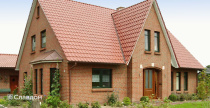 Трехэтажный частный дом с облицовкой кирпичом Roben Wiesmoor rotblau bunt