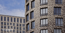 Жилой район с облицовкой кирпичом Roben Oslo perlweiss, Faro grau, Faro schwarz-nuanciert, Chelsea basalt-bunt, Manchester